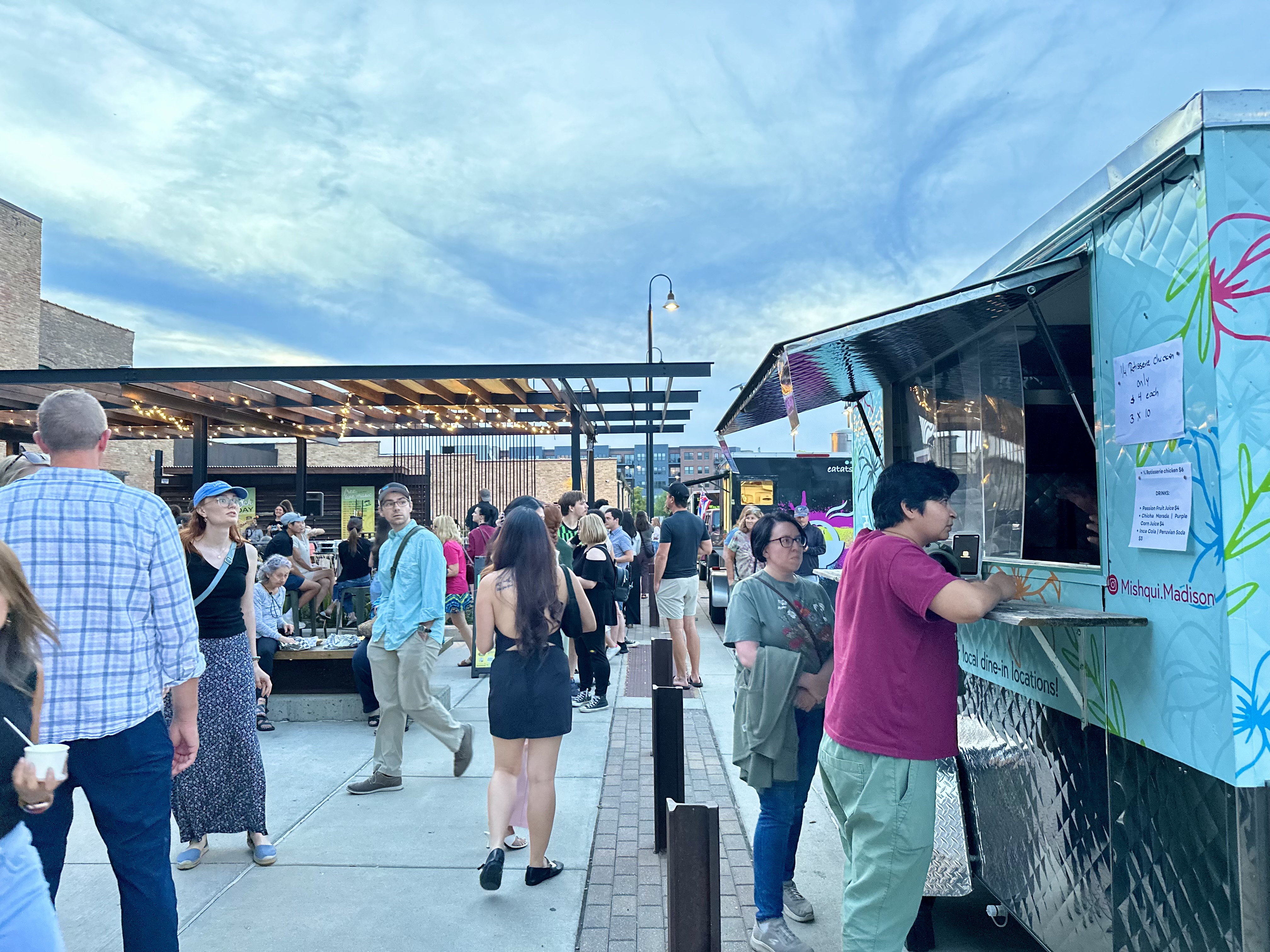 Food trucks lined up on the Garver patio during a Friday evening event
