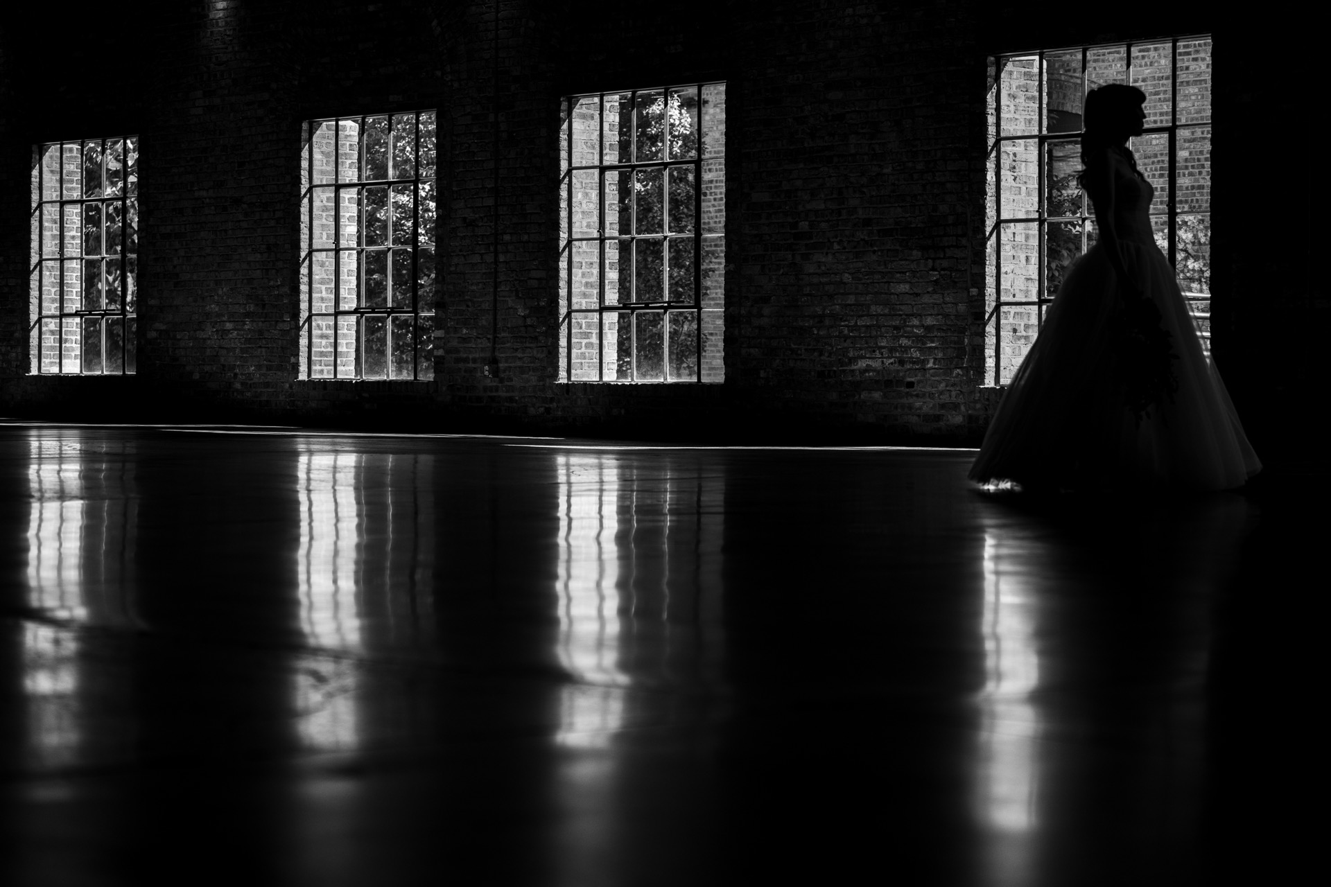 Moody portrait of bride in the Garver Atrium